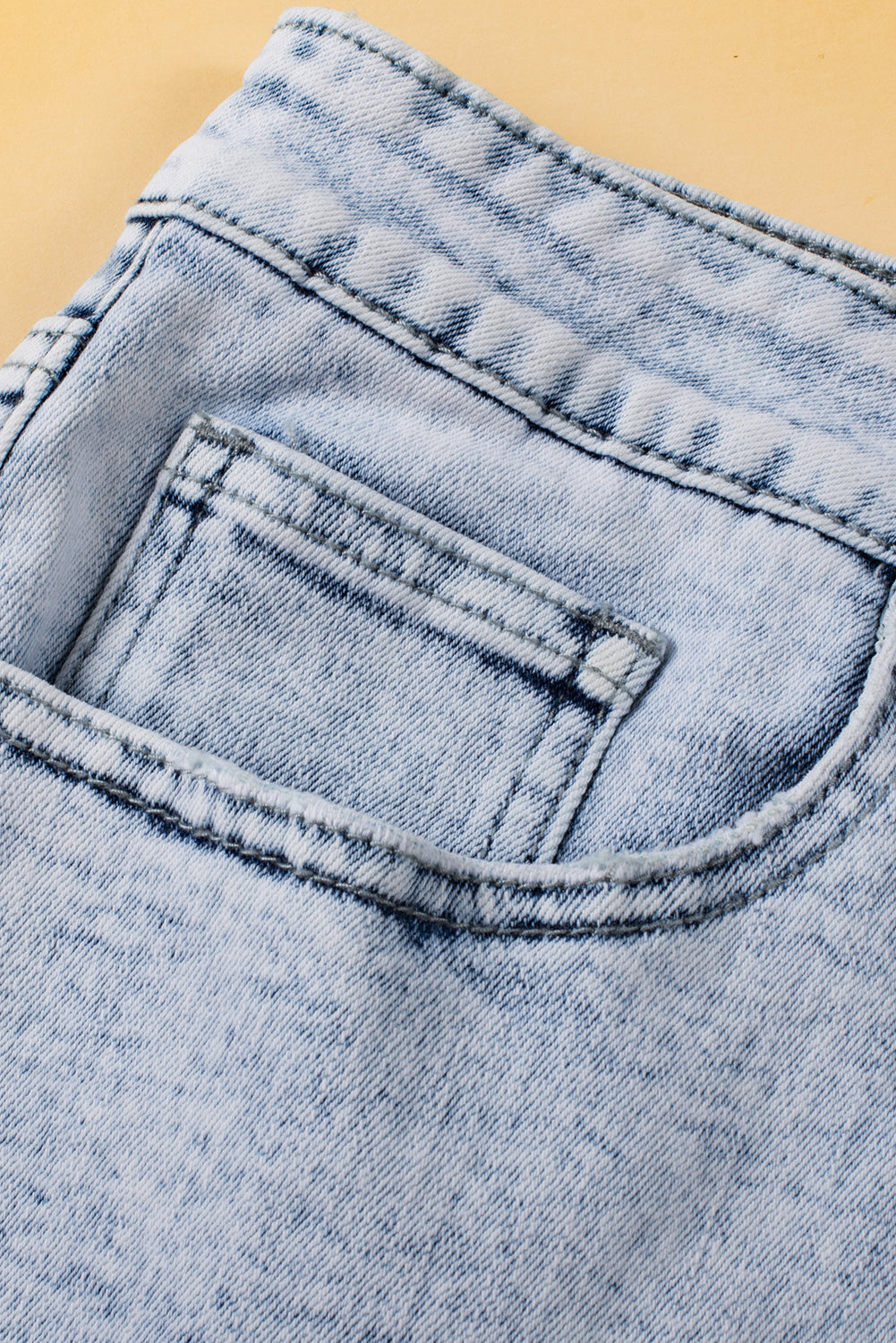 Acid Wash Crossed Raw Edge Denim Shorts